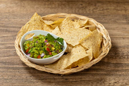 Guacamole dip and nachosの写真素材