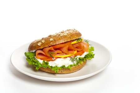 Cream cheese and smoked salmon bagel. Selective focus.の写真素材