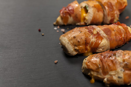 Prosciutto Wrapped Chicken breast. Selective focus.