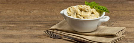 Creamy Tortellini Alfredo. Selective focus.の写真素材
