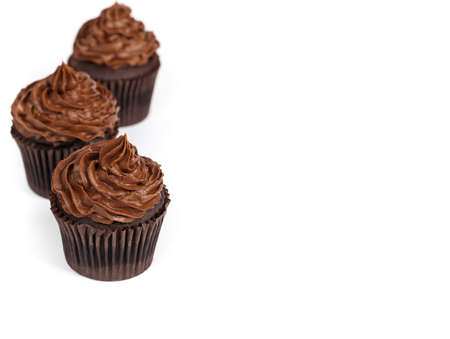 Gourmet chocolate cupcakes on a white background. Selective focus.の写真素材