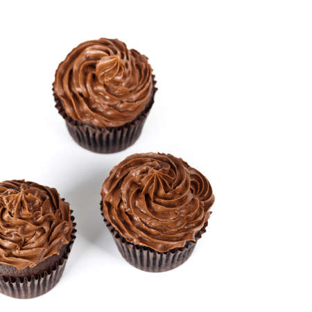 Gourmet chocolate cupcakes on a white background. Selective focus.の写真素材