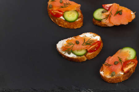Canape with smoked salmon. Selective focus.の写真素材
