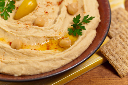 Hummus Dip with Olive Oil. Selective focus.