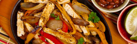 Chicken Fajitas with Grilled Onions and Bell Peppers. Selective focus.の写真素材