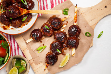 Sweet BBQ Meatballs in Barbecue Sauce. Selective focus.の写真素材