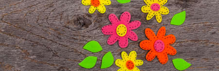 Handmade Felt Fabric Flowers Background. Selective focus.の写真素材