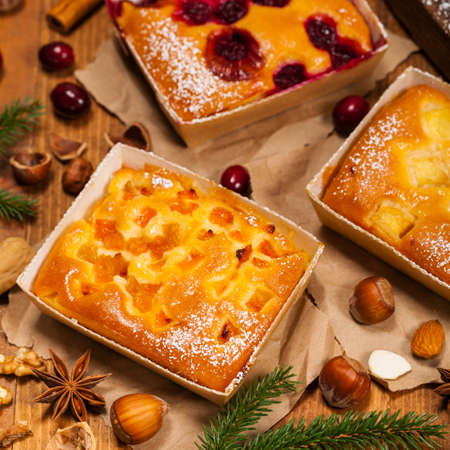 Christmas Holiday Baking Dessert Fruit Apricot, Apple and Cranberry Cakes. Selective focus.の写真素材