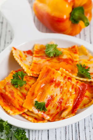 Roasted Pumpkin and Bell Pepper Ravioli. Selective focus.の写真素材