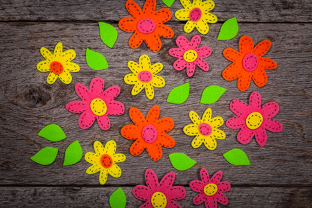 Handmade Felt Fabric Flowers Background. Selective focus.の写真素材