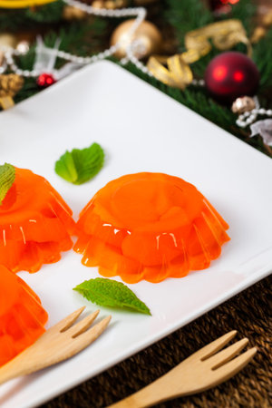 Mandarin Orange Jelly Christmas Desserts. Selective and soft focus.