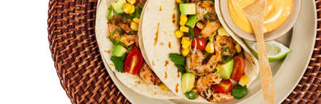 Shrimp Tacos with Corn and Avocado Salsa. Selective focus.の写真素材