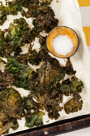 Baked Crispy Kale Chips. Selective focus.の写真素材