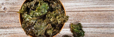 Baked Crispy Kale Chips. Selective focus.の写真素材