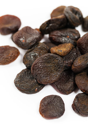 Organic Dried Apricots on White Background. Selective focus.の写真素材
