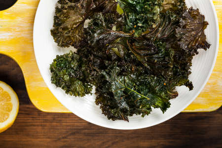 Baked Crispy Kale Chips. Selective focus.の写真素材
