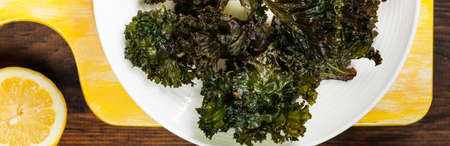 Baked Crispy Kale Chips. Selective focus.の写真素材