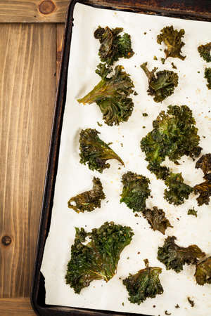 Baked Crispy Kale Chips. Selective focus.の写真素材