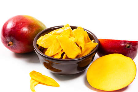 Dried Mango Fruit on white background. Selective focus.の写真素材
