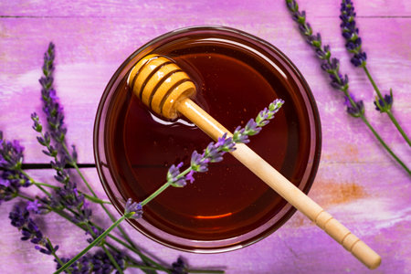 Lavender Herbal Honey with Lavender Flowers. Selective focus.