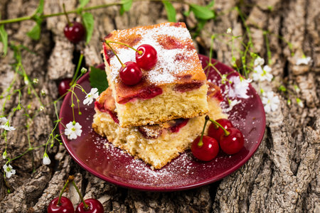 Breakfast Cherry Cake with Powdered Sugar. Selective focus.