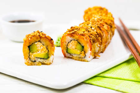 New York Crunch Sushi Roll. Selective focus.の写真素材