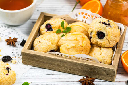Mini Scones Variety. Orange and Blueberry Mini Scone Cookies. Selective focus.の写真素材
