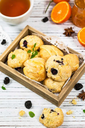 Mini Scones Variety. Orange and Blueberry Mini Scone Cookies. Selective focus.の写真素材