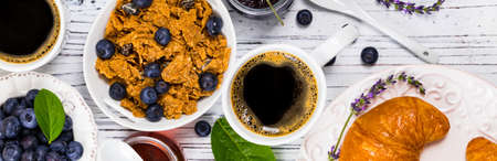 Continental Breakfast with Croissants, Coffee, Cereals and Fruits. Selective focus.の写真素材
