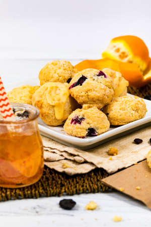 Mini Scones Variety. Orange and Blueberry Mini Scone Cookies. Selective focus.の写真素材
