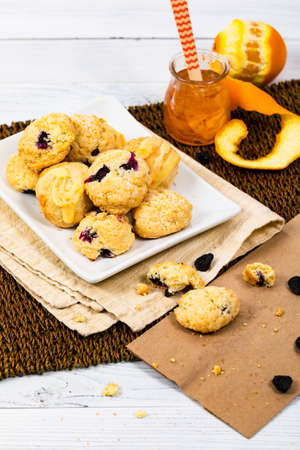 Mini Scones Variety. Orange and Blueberry Mini Scone Cookies. Selective focus.の写真素材