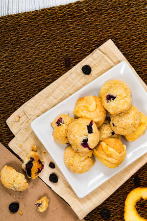 Mini Scones Variety. Orange and Blueberry Mini Scone Cookies. Selective focus.の写真素材