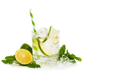 Moscow Mule Cocktail Isolated on White Background. A Moscow mule is a cocktail made with vodka, spicy ginger beer, and lime juice. Selective focus.の写真素材