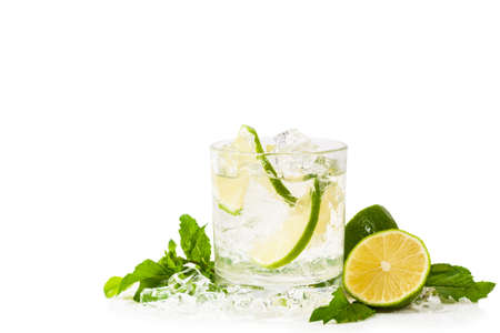 Moscow Mule Cocktail Isolated on White Background. A Moscow mule is a cocktail made with vodka, spicy ginger beer, and lime juice. Selective focus.の写真素材