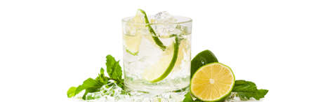Moscow Mule Cocktail Isolated on White Background. A Moscow mule is a cocktail made with vodka, spicy ginger beer, and lime juice. Selective focus.の写真素材