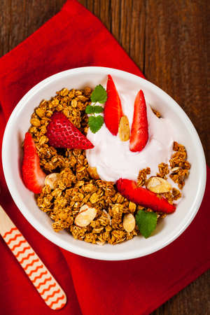 Strawberry Cinnamon Granola Yogurt Breakfast. Selective focus.の写真素材