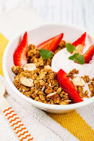 Strawberry Cinnamon Granola Yogurt Breakfast. Selective focus.の写真素材