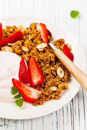 Strawberry Cinnamon Granola Yogurt Breakfast. Selective focus.の写真素材