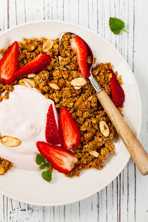 Strawberry Cinnamon Granola Yogurt Breakfast. Selective focus.の写真素材