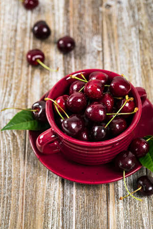 Cherry on Wooden Background. Selective focus.の写真素材