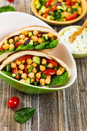 Garbanzo Bean or Chickpea Salad Veggie Pitas. Selective focus.の写真素材