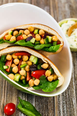 Garbanzo Bean or Chickpea Salad Veggie Pitas. Selective focus.の写真素材