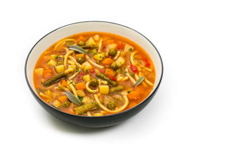 Vegetarian Vegetable Soup Isolated on a white background. Selective focus.の写真素材