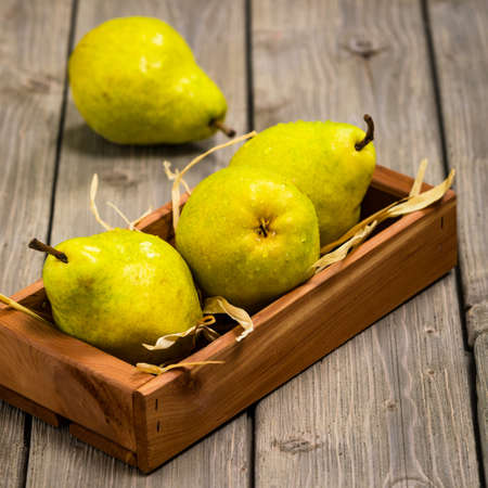 Fresh Ripe Organic Pears on a Wooden Table. Selective focus.の写真素材
