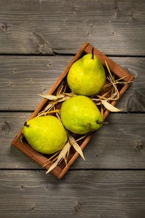 Fresh Ripe Organic Pears on a Wooden Table. Selective focus.の写真素材