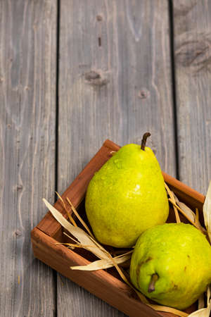 Fresh Ripe Organic Pears on a Wooden Table. Selective focus.の写真素材