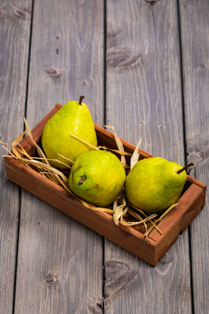 Fresh Ripe Organic Pears on a Wooden Table. Selective focus.の写真素材