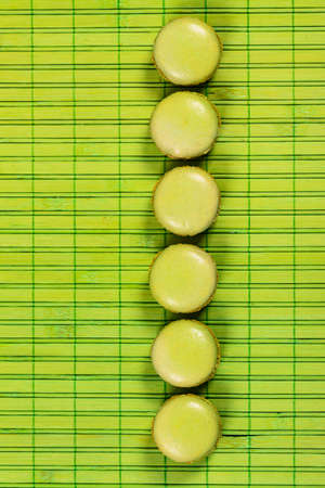 Green Pistachio Macaron Cookies Background. Selective focus.の写真素材