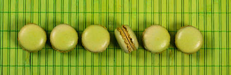 Green Pistachio Macaron Cookies Background. Selective focus.の写真素材
