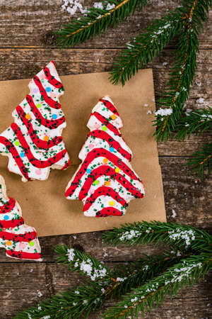 Christmas Tree Cakes on Wooden Background. Christmas Background. Selective focus.の写真素材